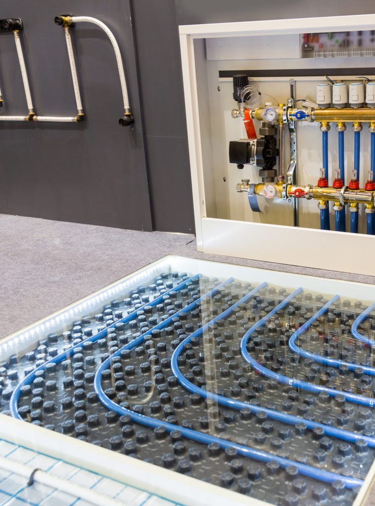 Floor heating distributor, exhibition sample in the store. Mounting or installation scheme, warm house control